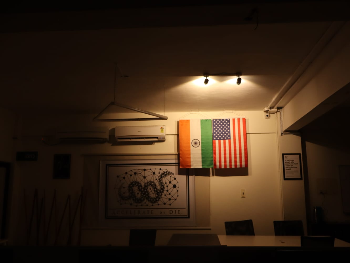 Inside Zemuria - the India and United States flags beside the studio credo at our Pondy by the Bay headquarters.